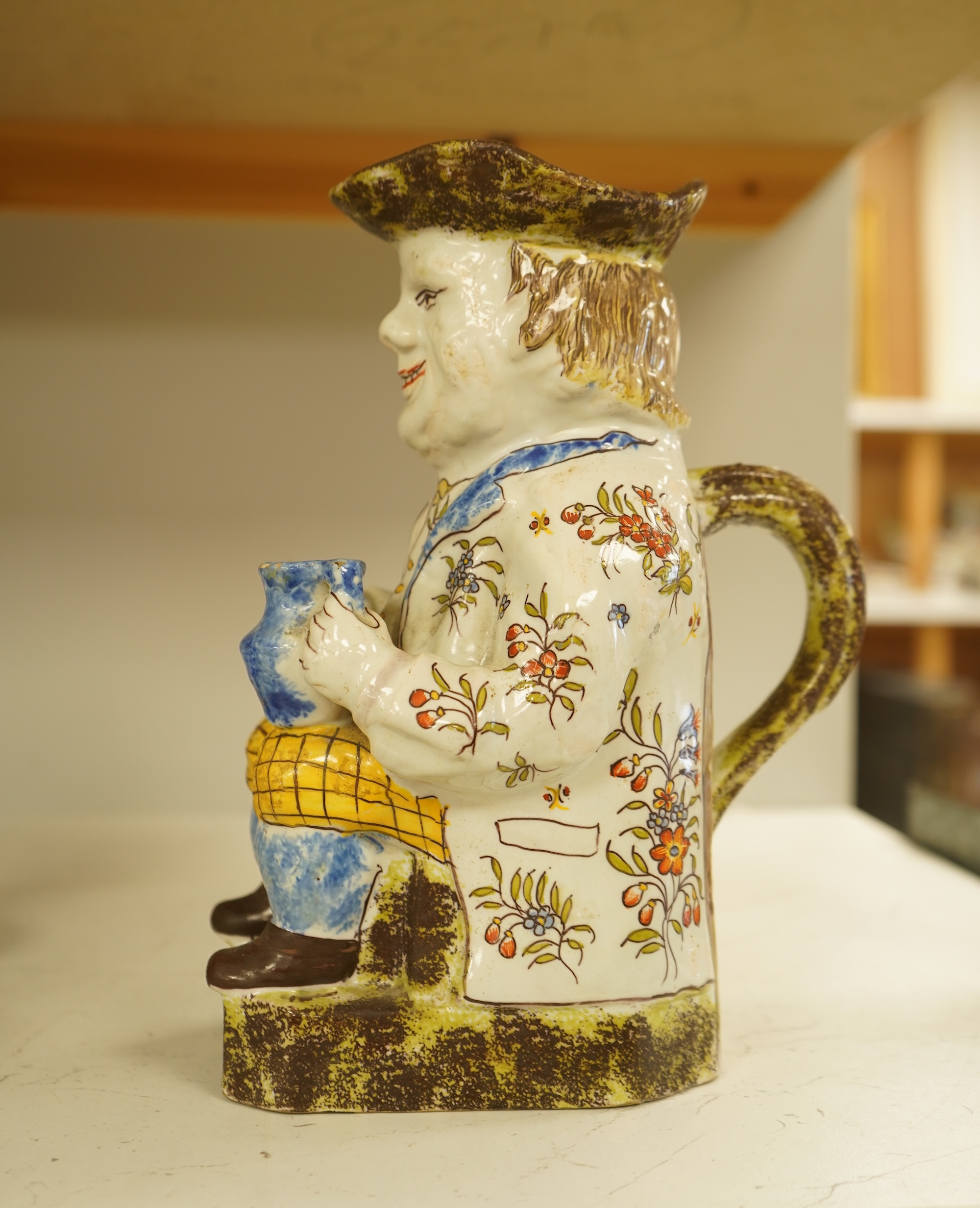 A French 'Rouen' Faience Toby Jug, 20th century, 25cm